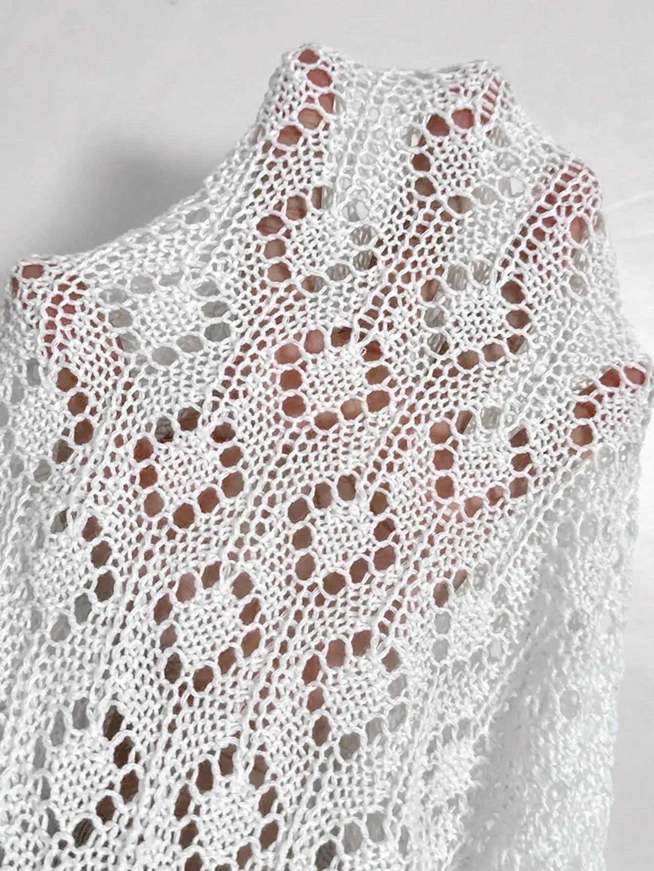 Ruffled Openwork Round Neck Knit Top