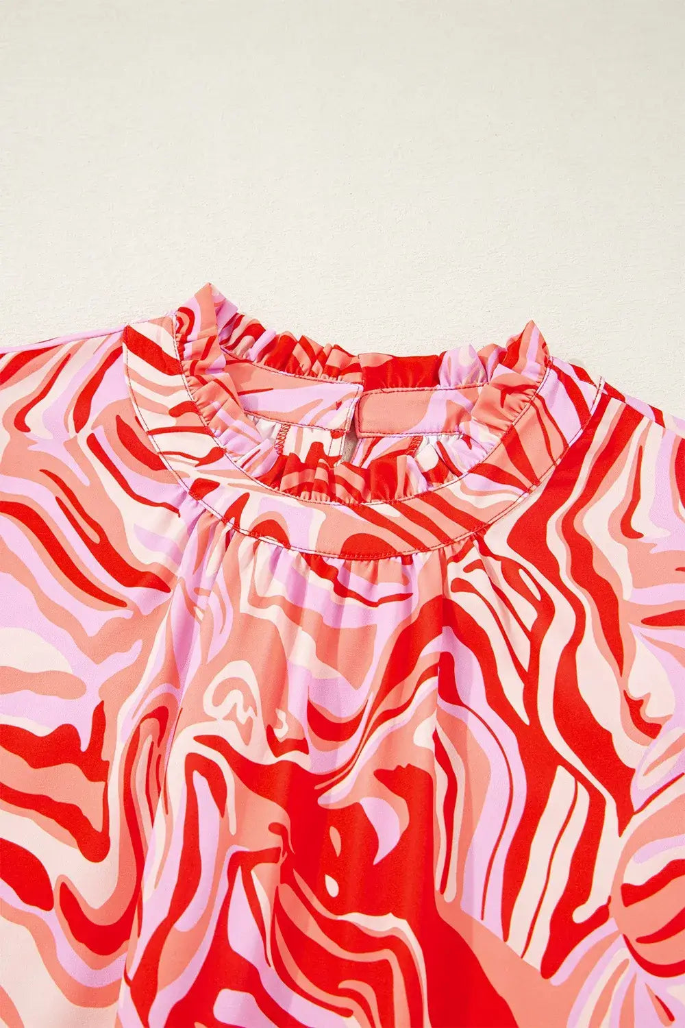 Abstract Print Ruffled Short Sleeve Mock Neck Blouse