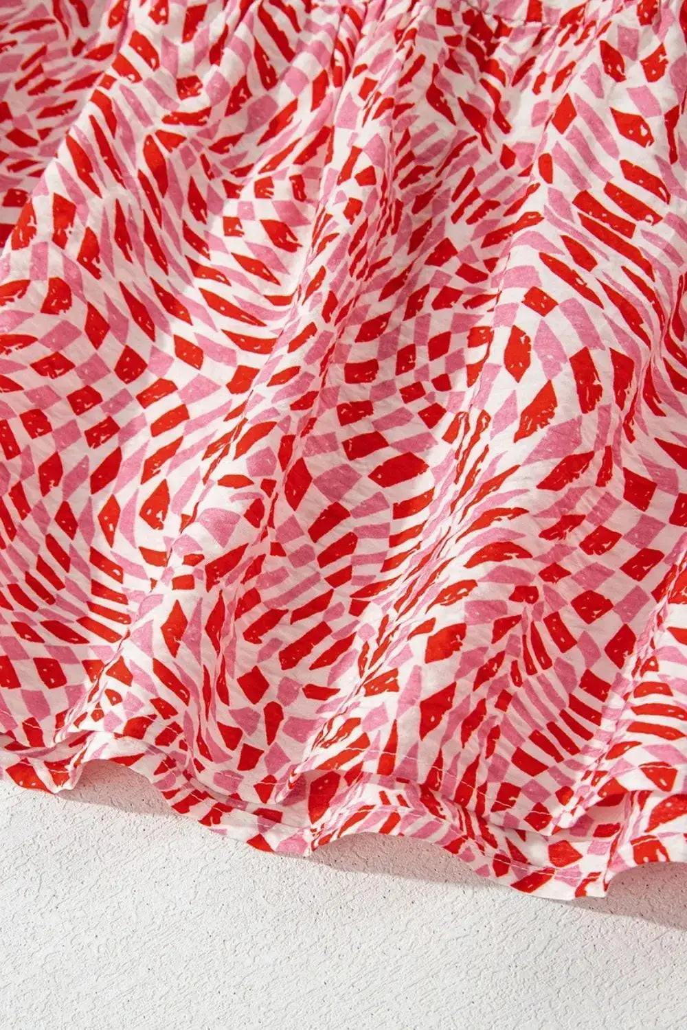Geometric Print Knot Back Sleeveless Ruffle Hem Dress