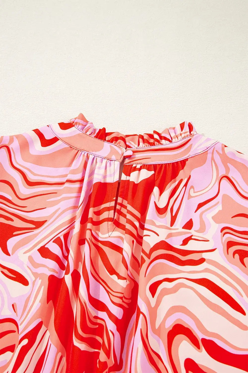Abstract Print Ruffled Short Sleeve Mock Neck Blouse
