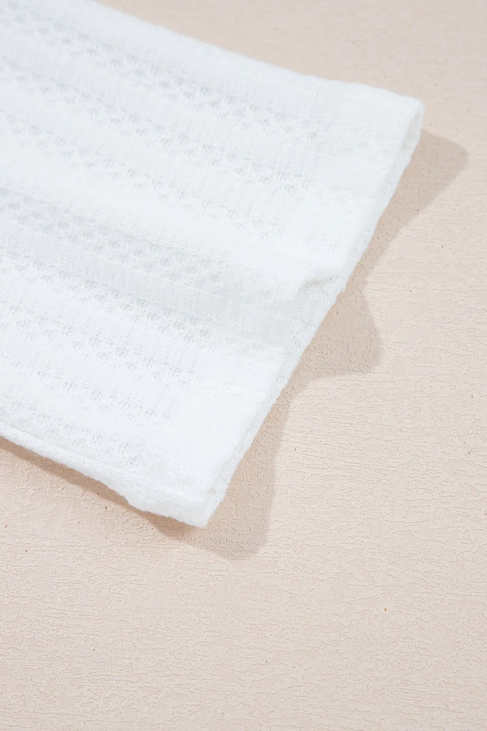 Textured Hollow Grommet Placket Split Neck Short Sleeve Top