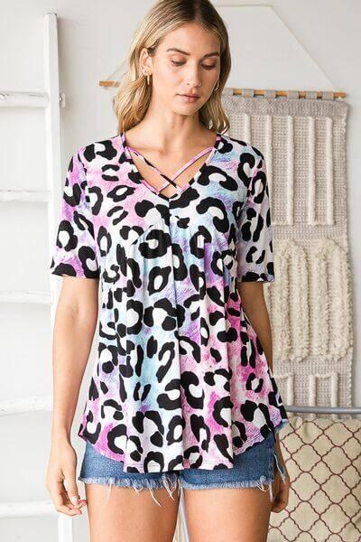 Heimish Full Size Crisscross Neck Animal Print Babydoll Top Plus Size - Clothes For Her Online Store
