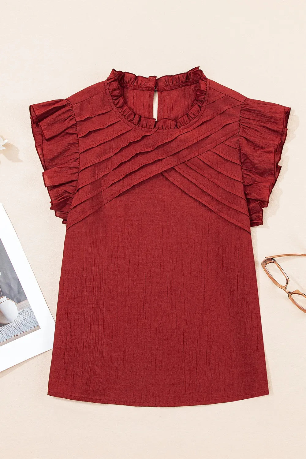 Dahlia Solid Color Pleated Detail Ruffle Short Sleeve Blouse