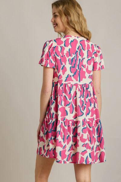 Umgee Full Size Abstract Print Pleat Detail Short Sleeve V-Neck Tiered Dress Plus Size - Clothes For Her Online Store