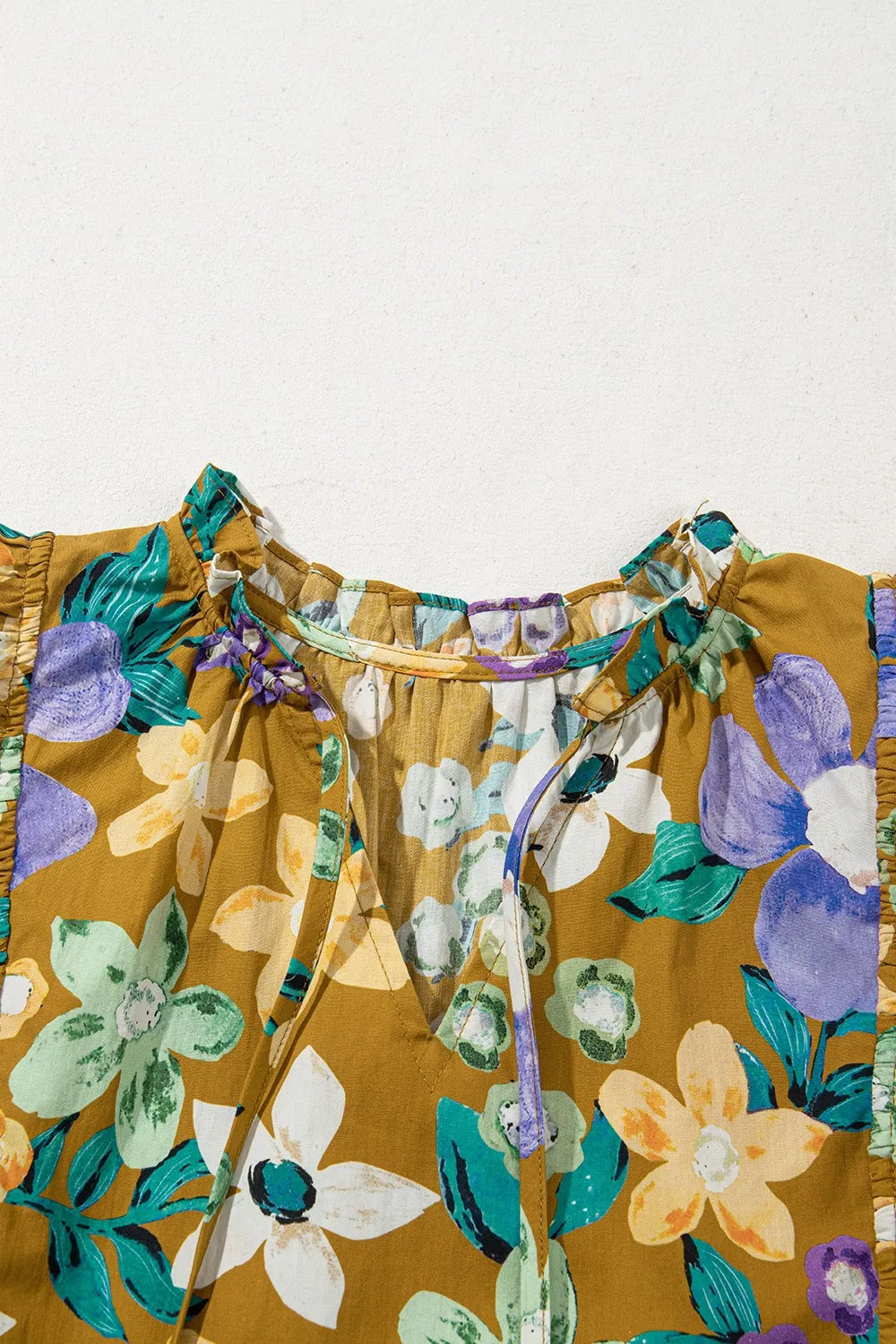 Floral Print Ruffle Cap Sleeve Tie Neck Top