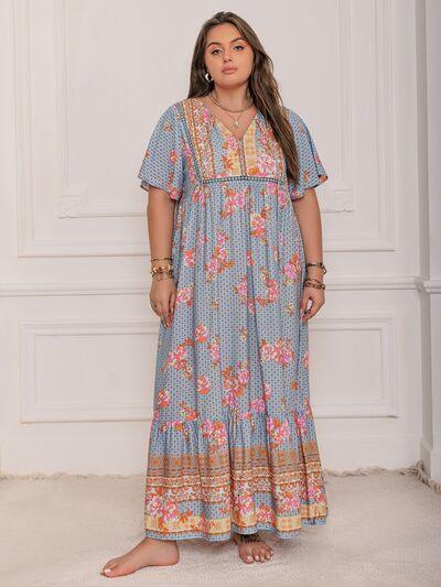 Plus Size Printed Tie Neck Flutter Sleeve Maxi Dress