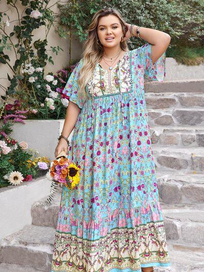 Plus Size Printed Tie Neck Flutter Sleeve Maxi Dress