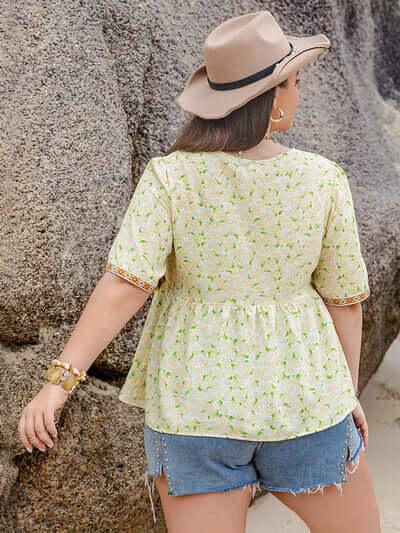 Plus Size Printed Tie Neck Half Sleeve Blouse