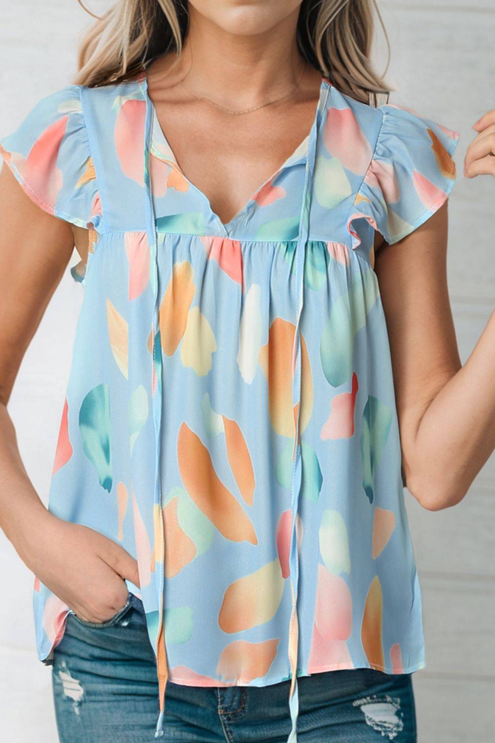 Splotches Pattern Ruffled Cap Sleeve Blouse