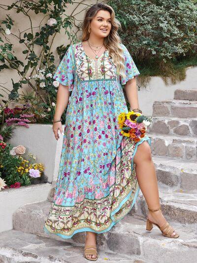 Plus Size Printed Tie Neck Flutter Sleeve Maxi Dress