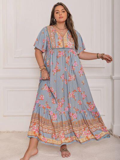 Plus Size Printed Tie Neck Flutter Sleeve Maxi Dress