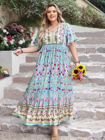 Plus Size Printed Tie Neck Flutter Sleeve Maxi Dress