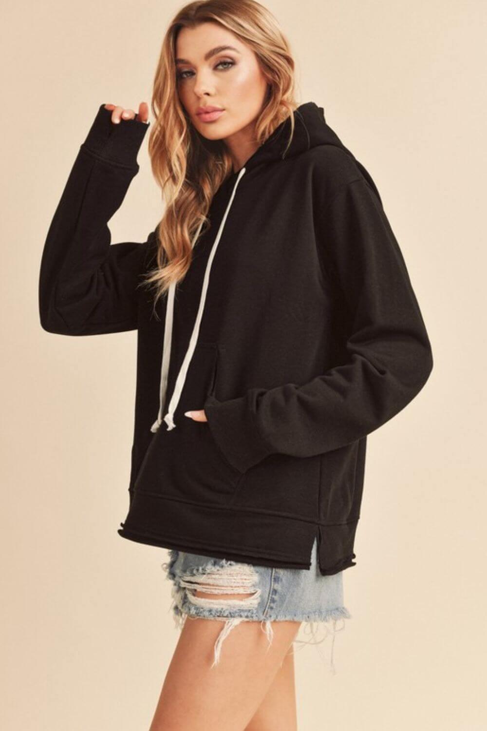 Aemi + Co Raw Hem Kangaroo Pocketed Drawstring Hoodie