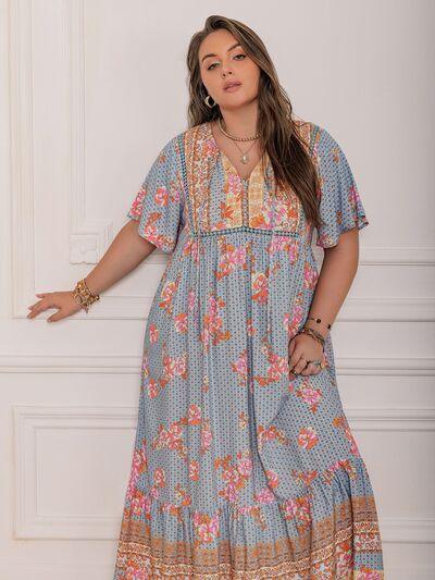 Plus Size Printed Tie Neck Flutter Sleeve Maxi Dress