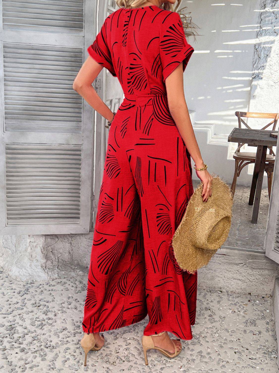 Devine Printed Notched Short Sleeve Wide Leg Jumpsuit