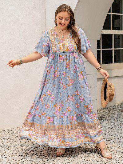 Plus Size Printed Tie Neck Flutter Sleeve Maxi Dress