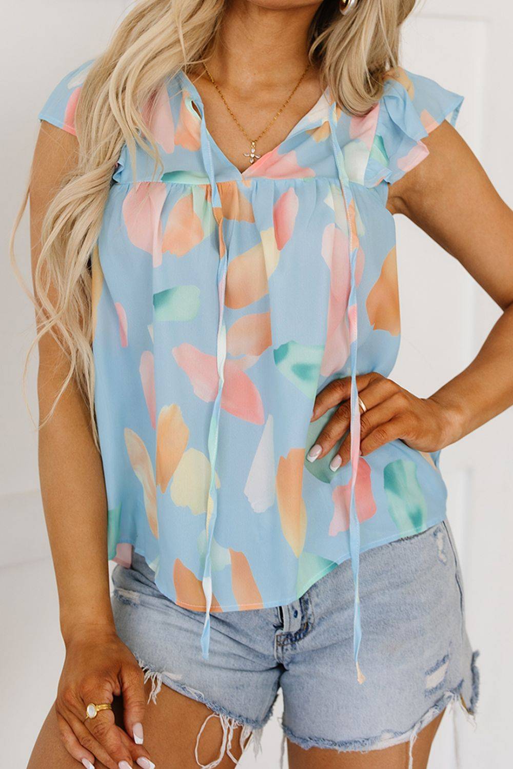 Splotches Pattern Ruffled Cap Sleeve Blouse