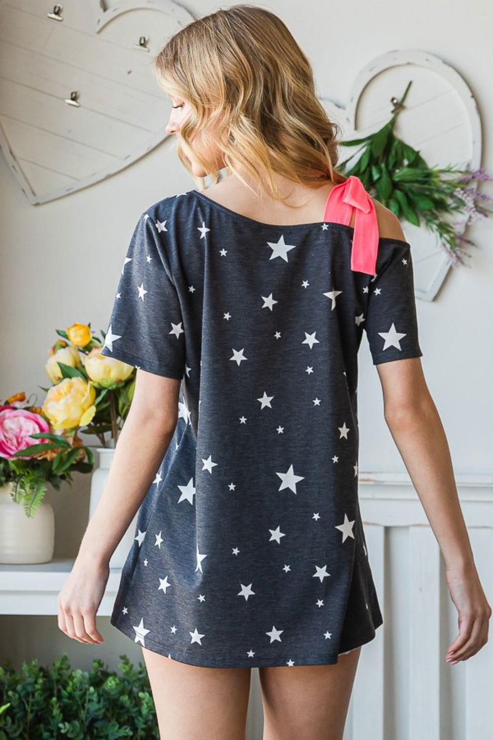Heimish Full Size Star Print Asymmetrical Neck Short Sleeve Top - Clothes For Her Online Store