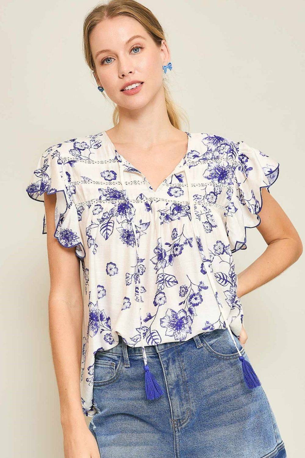 Umgee Full Size Floral Print Tassel Tie Neck Scalloped Sleeve Blouse Plus Size - Clothes For Her Online Store