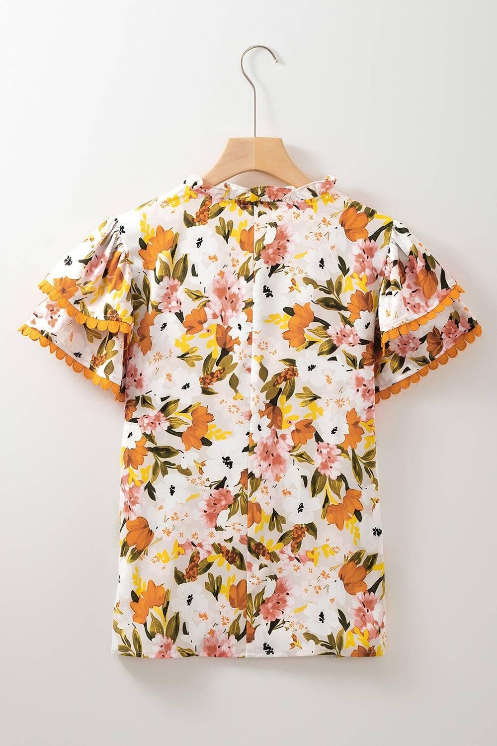 Ruffled Notched Short Sleeve Floral Blouse