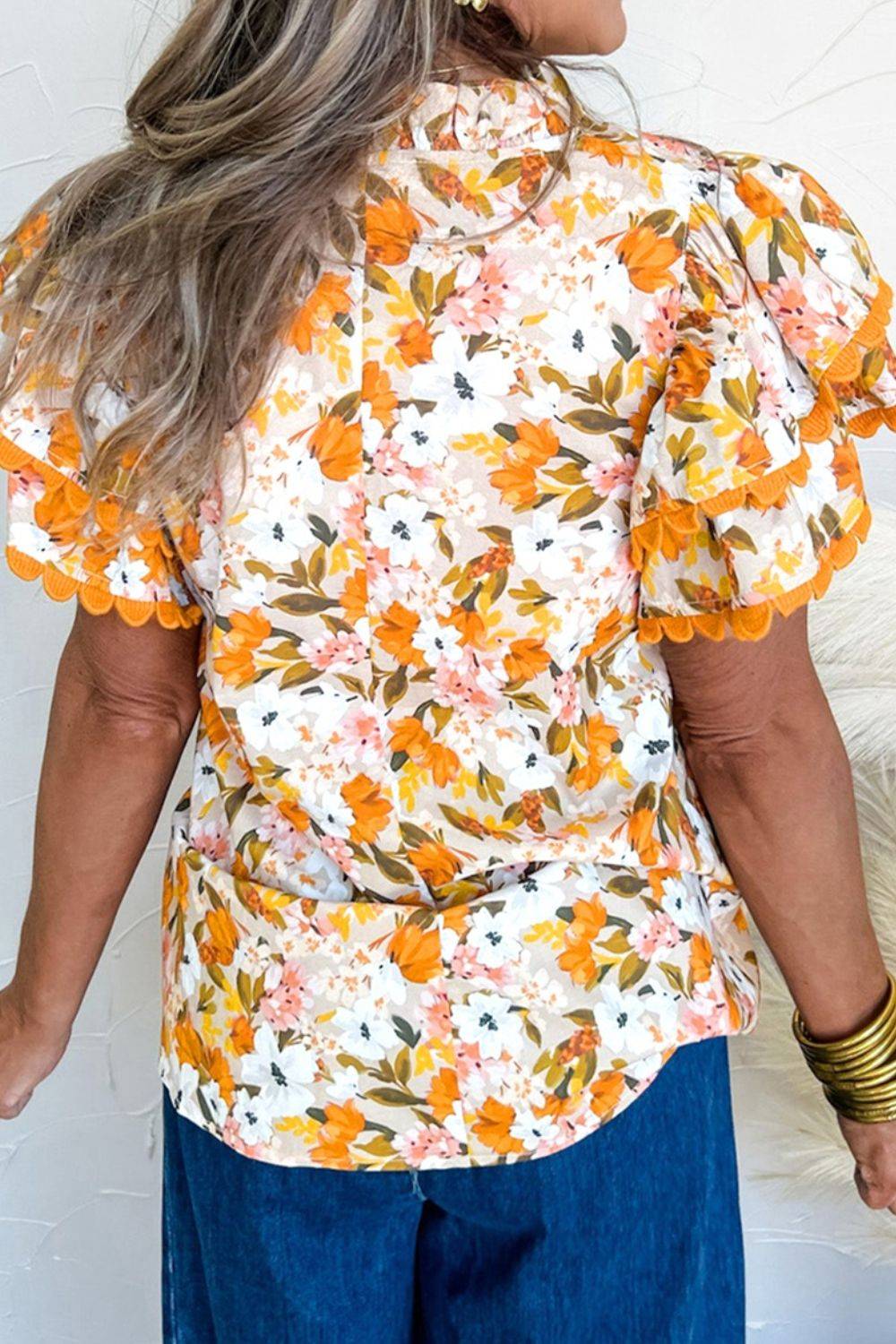 Ruffled Notched Short Sleeve Floral Blouse